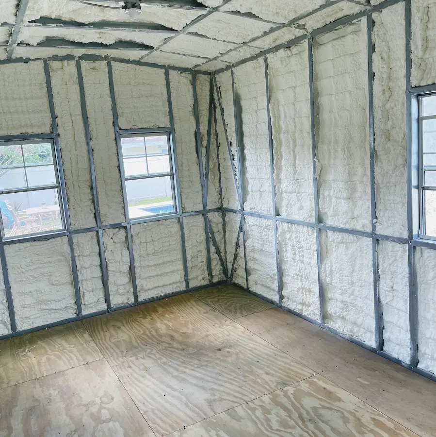 Closed-cell spray foam insulation applied to wall cavities in a residential project in College Station